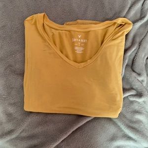 Soft and sexy size medium yellow shirt